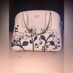Small pink Kate Spade bag with Spring design